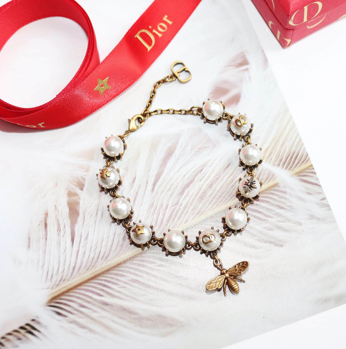 CD 18 BEE LONG PEARL BRACELETS